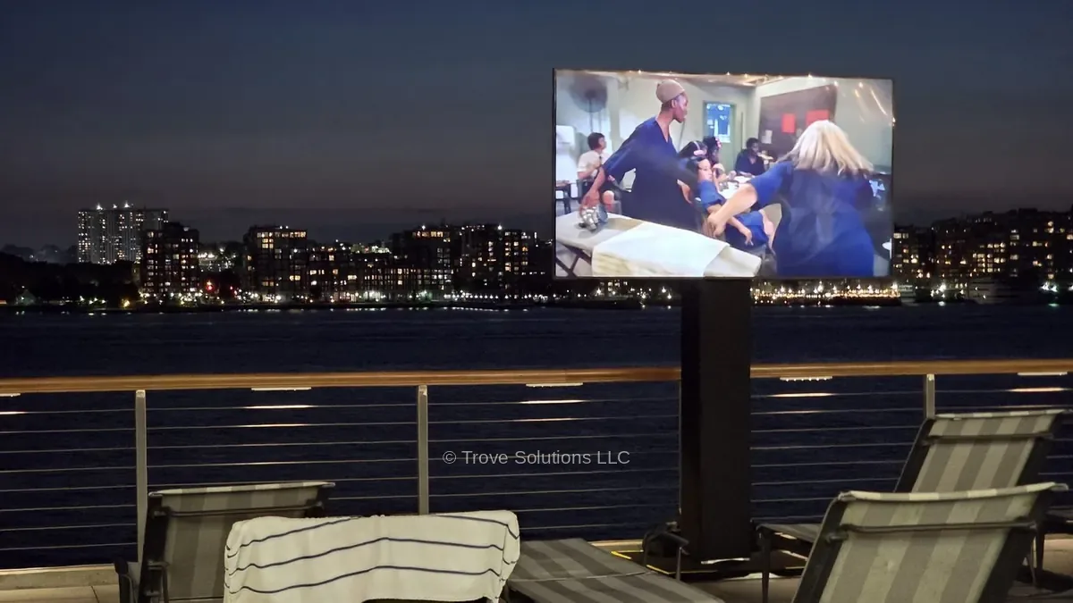 TV on mobile stand, outdoor installation Manhattan TV on mobile rolling stand outdoor installation Manhattan pier