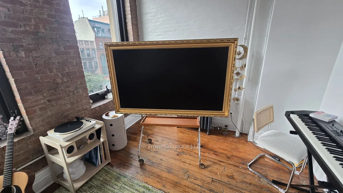 Frame TV on easel stand, Manhattan loft Frame TV on easel stand Manhattan loft — gold ornate frame